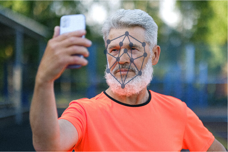 Man using face ID on phone