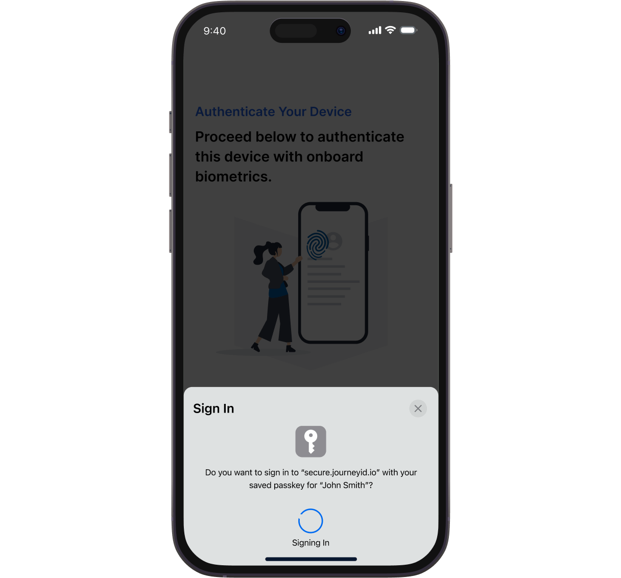 Phone screen showing signing in with a passkey