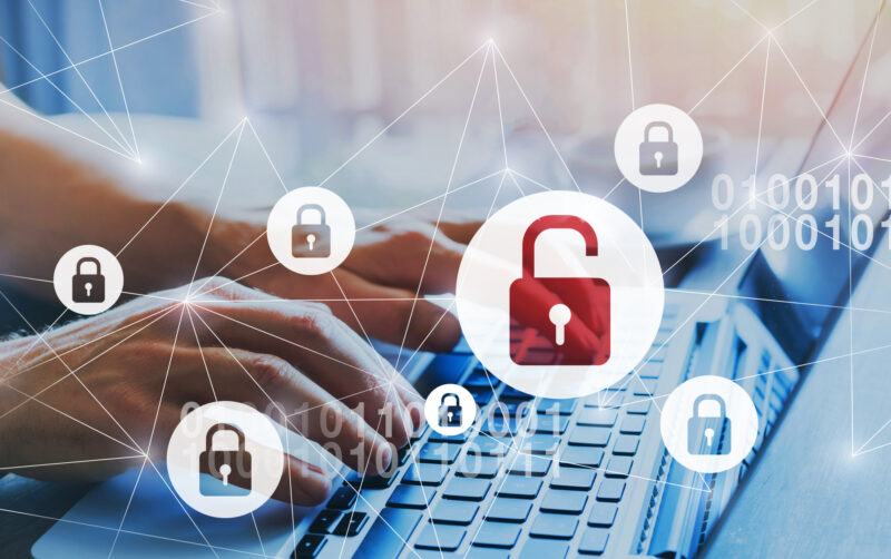 Illustrated lock in front of laptop