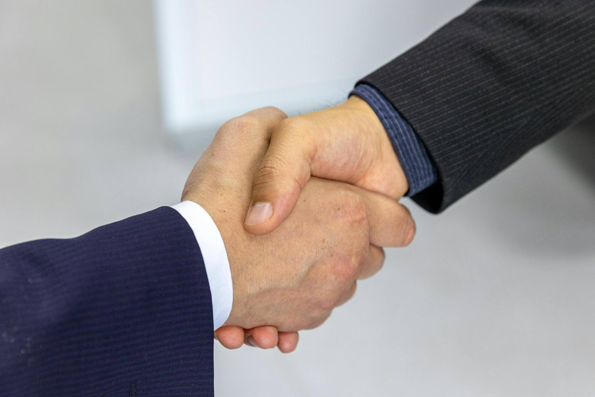 two business partners shaking hands