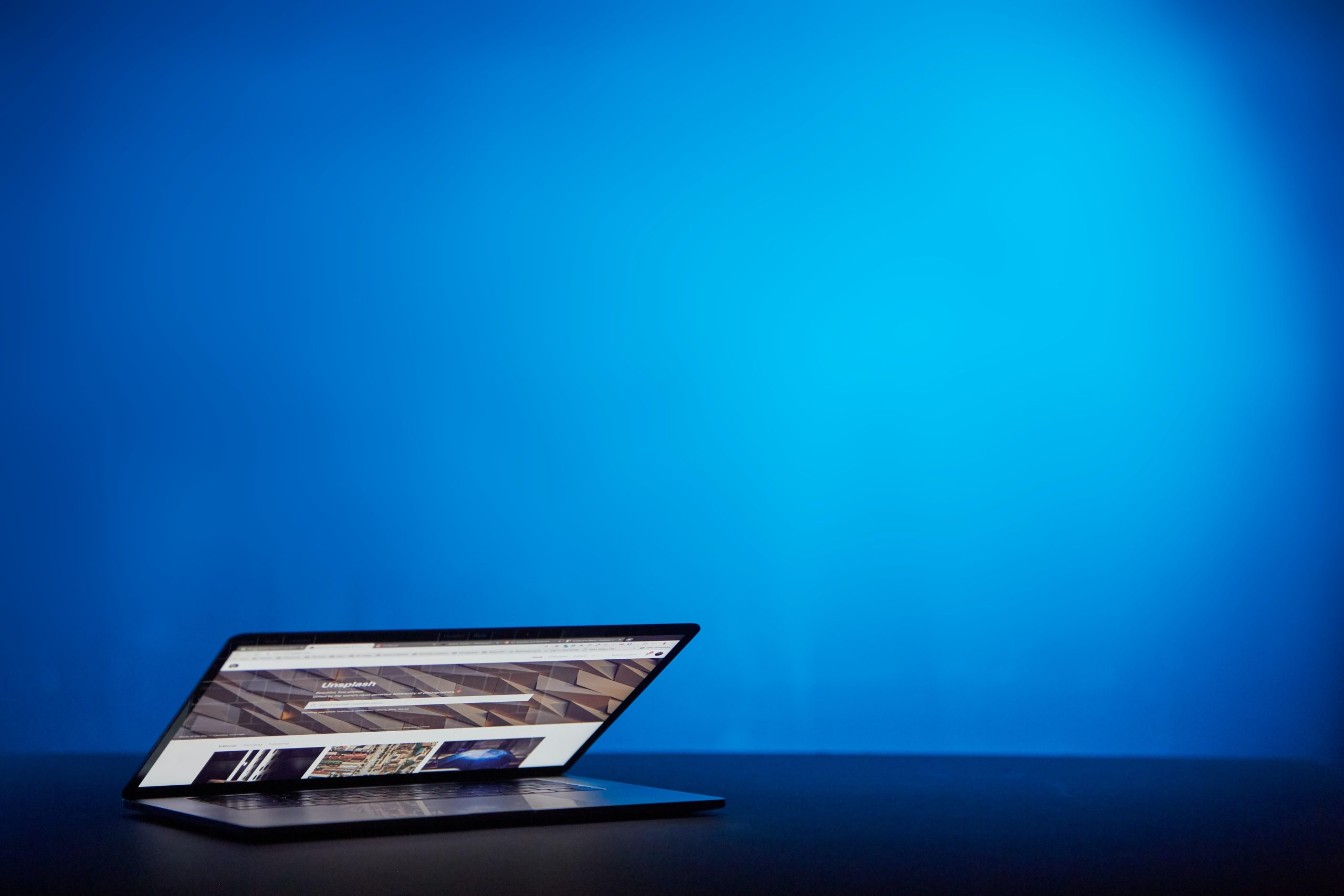 Laptop on blue background