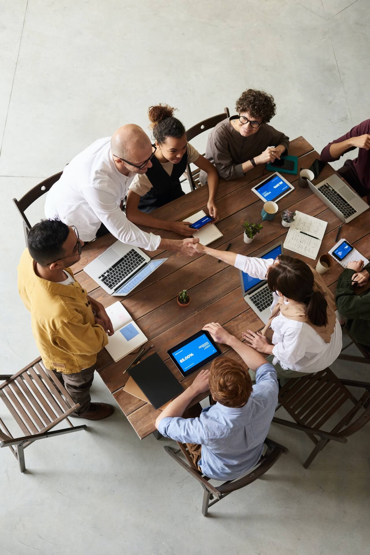 Team members sitting at table