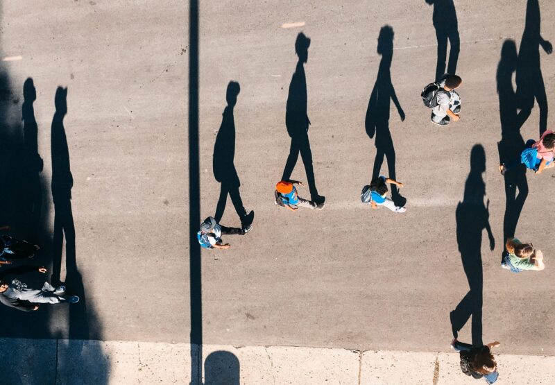 People walking and their shadows