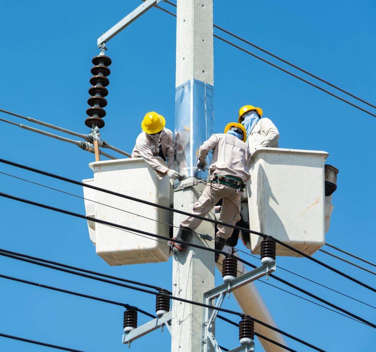 Utility workers on power line
